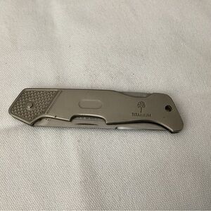 Boker Titan 1 4 3/8” closed single blade knife. Titanium handle. Pre-owned.